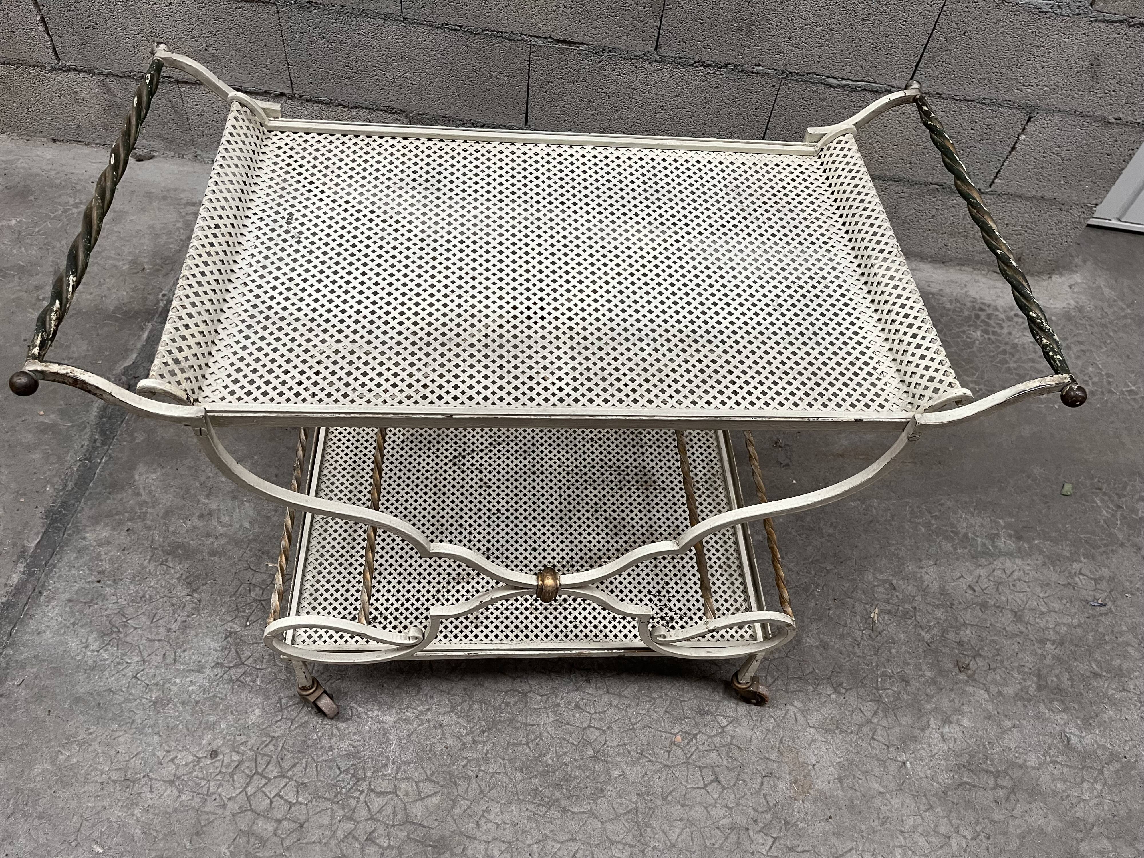 Service in wrought iron of the 60s