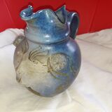 Blue glazed snare pitcher. Montours. Signed Dansette.