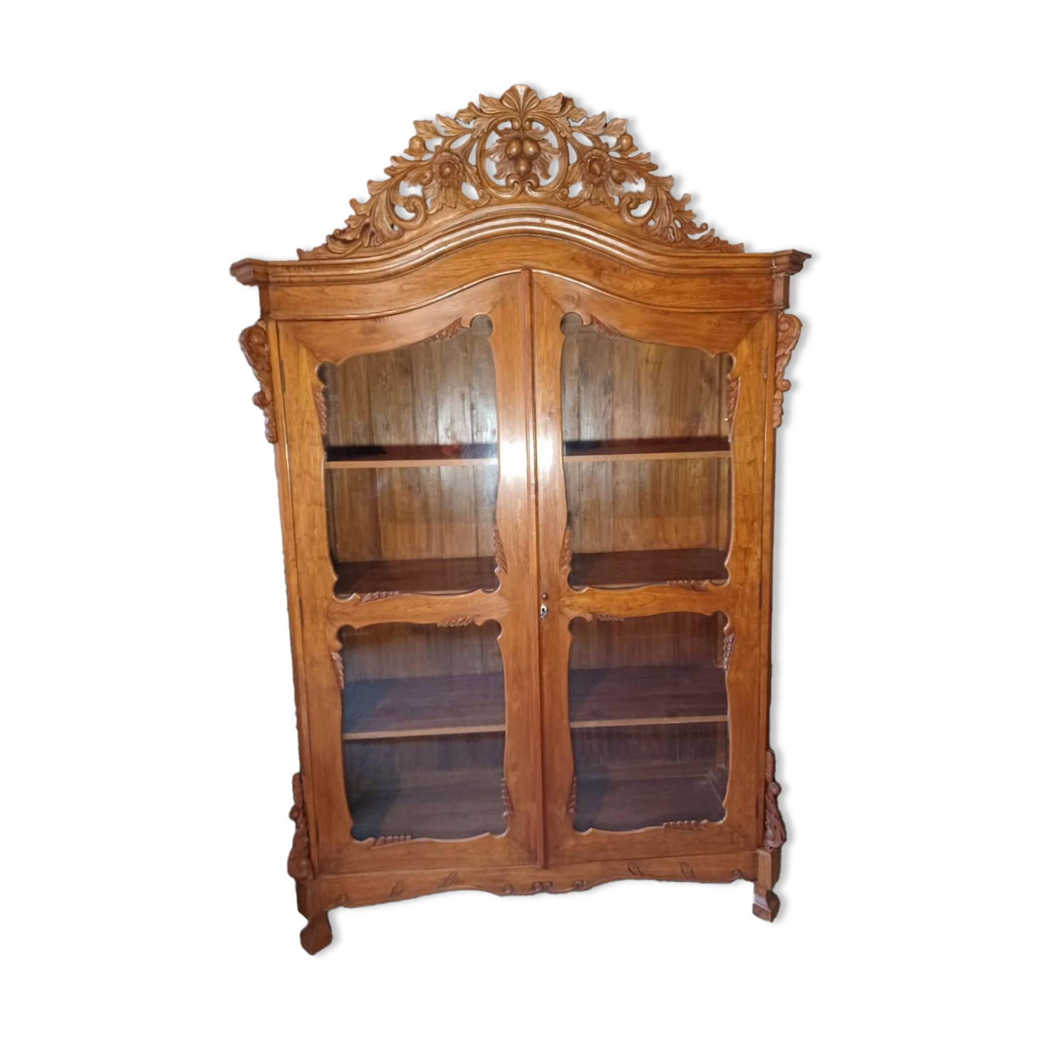 Large glass and carved cabinet