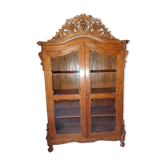 Large glass and carved cabinet