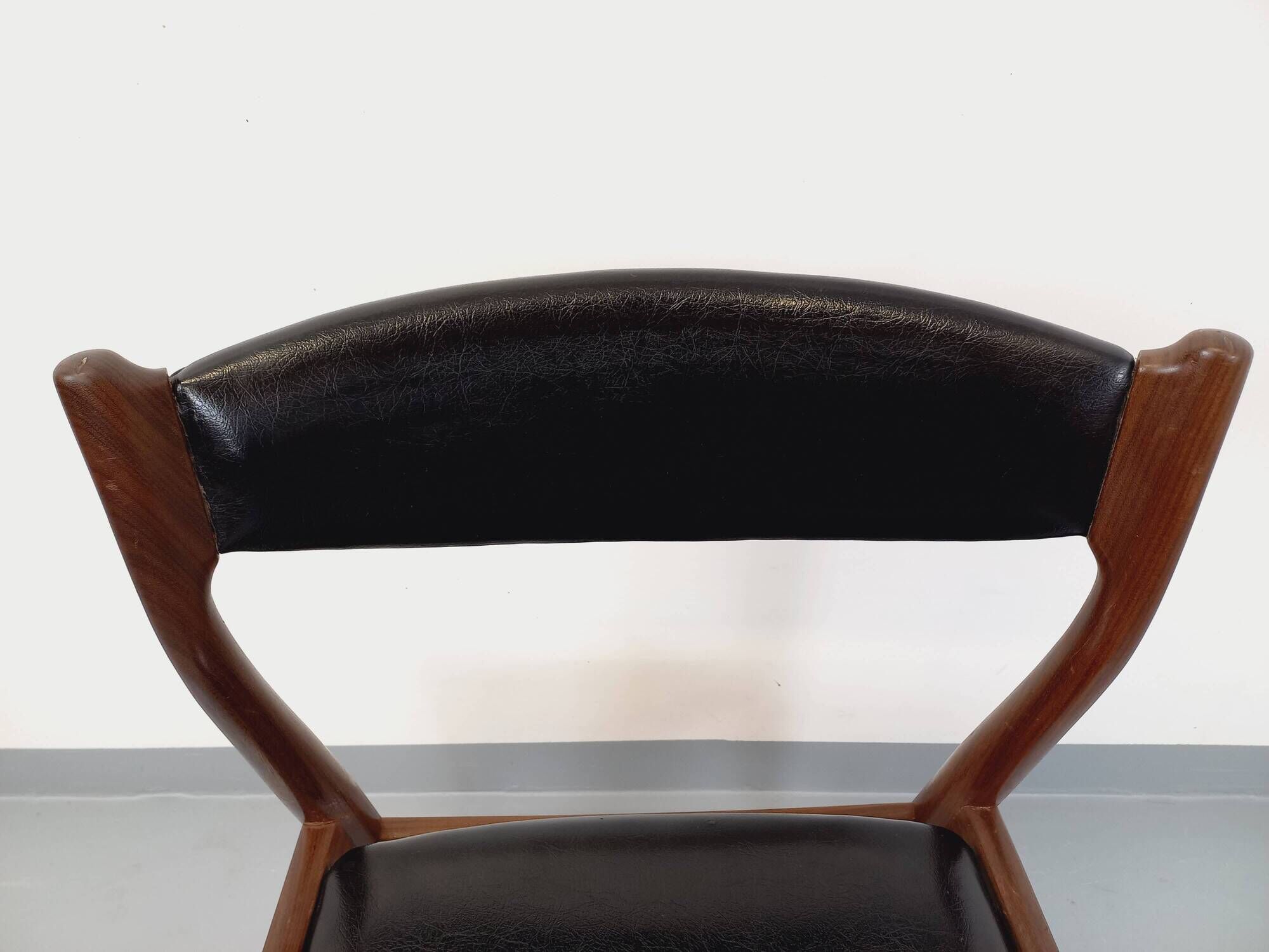 Vintage Scandinavian teak and leatherette chair from the 50s and 60s