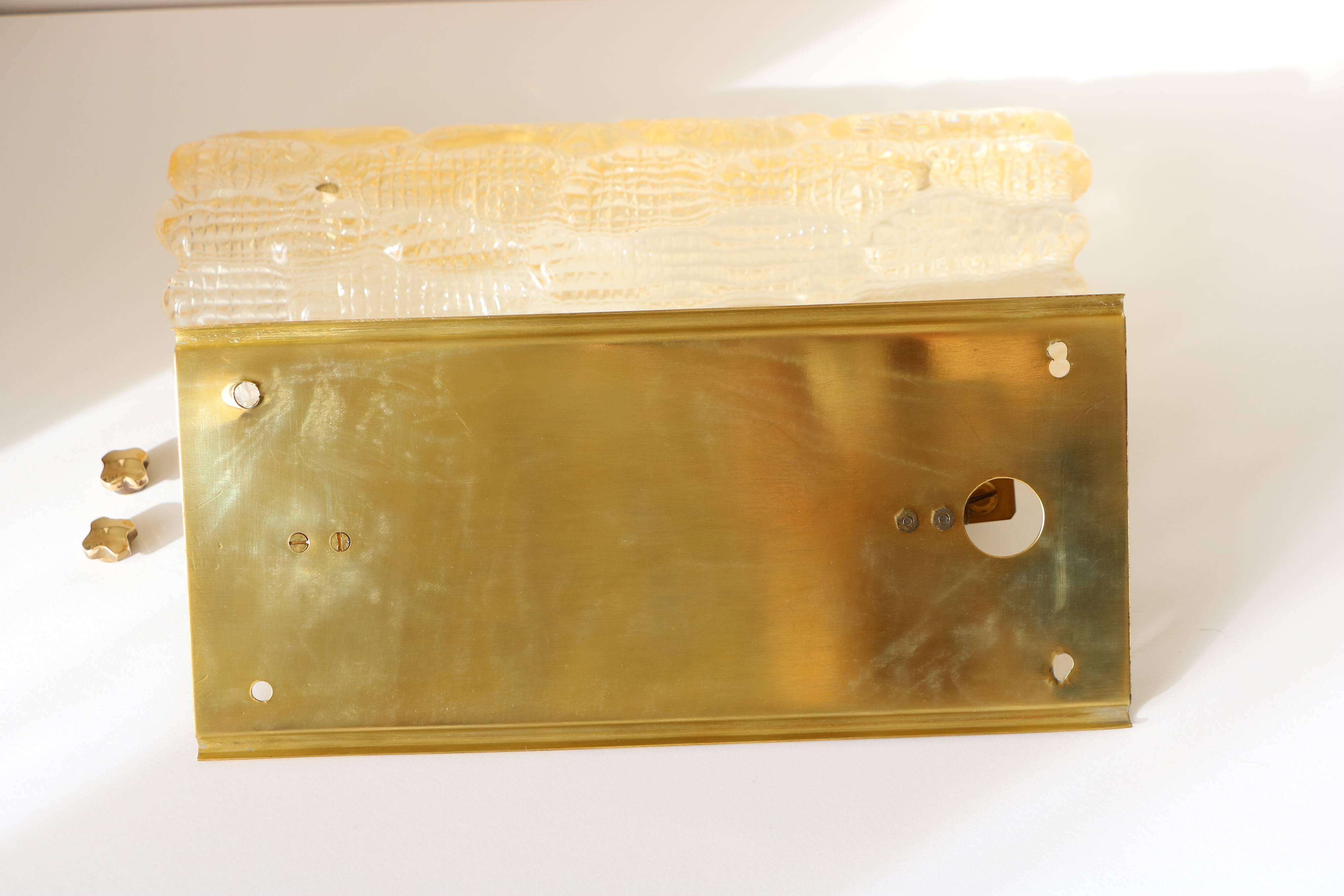 Glass and brass wall light by Carl Fagerlund for Orrefors, 1960.