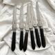 6 antique black wooden table knives La Trompette, late 19th century
