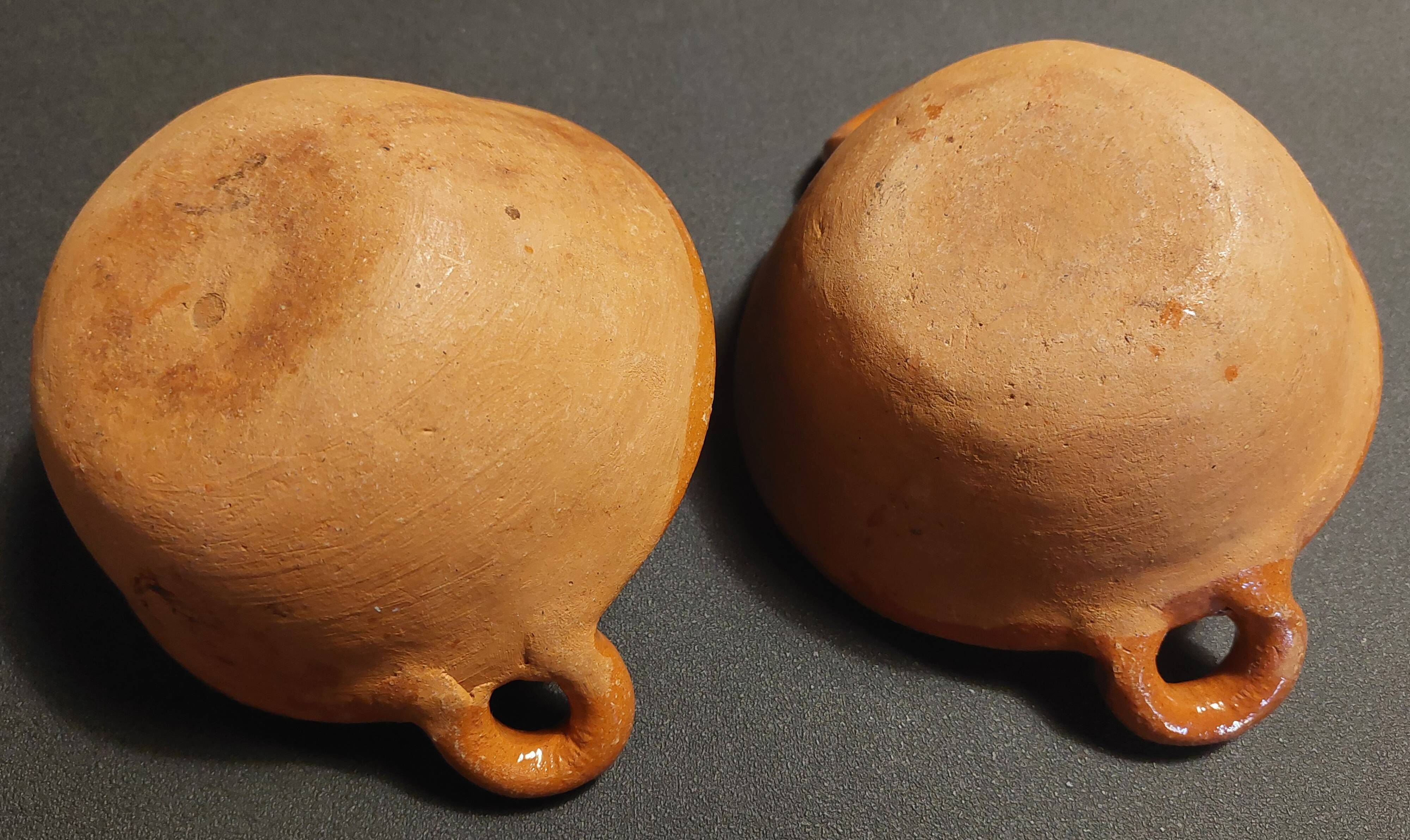 Pair of handled bowls, glazed terracotta, Mexico, mid-20th century.