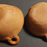 Pair of handled bowls, glazed terracotta, Mexico, mid-20th century.