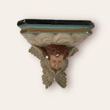 Nineteenth century plaster wall console, cherub decoration