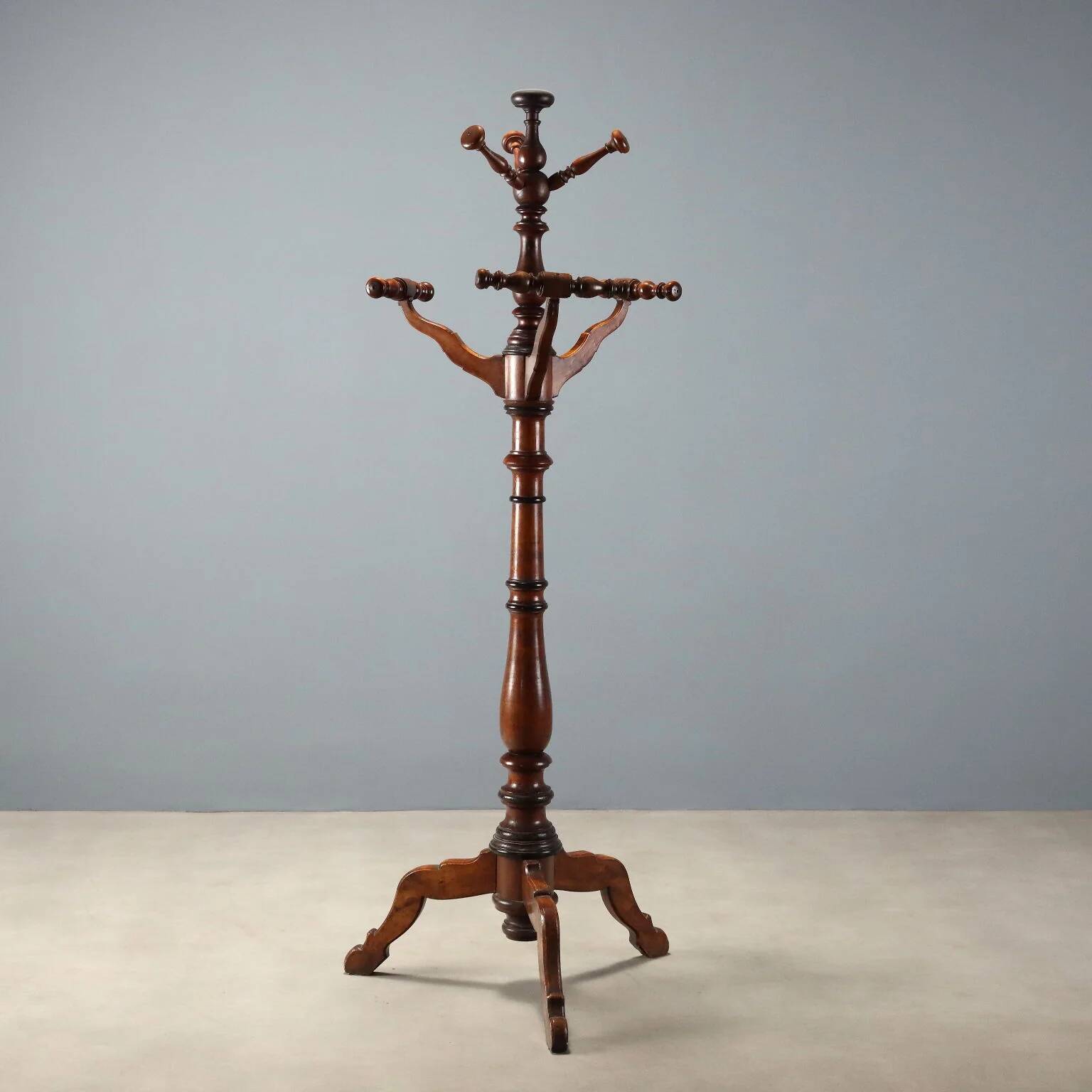 Antique coat rack in lime wood stained walnut, Italy, 19th century.