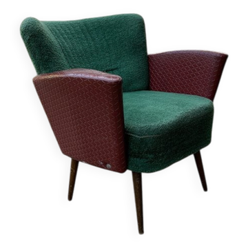 Vintage green cocktail chair in faux leather and wood, 1950s, compact mid-century design.