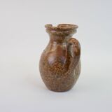 Brown speckled stoneware pitcher in very good condition