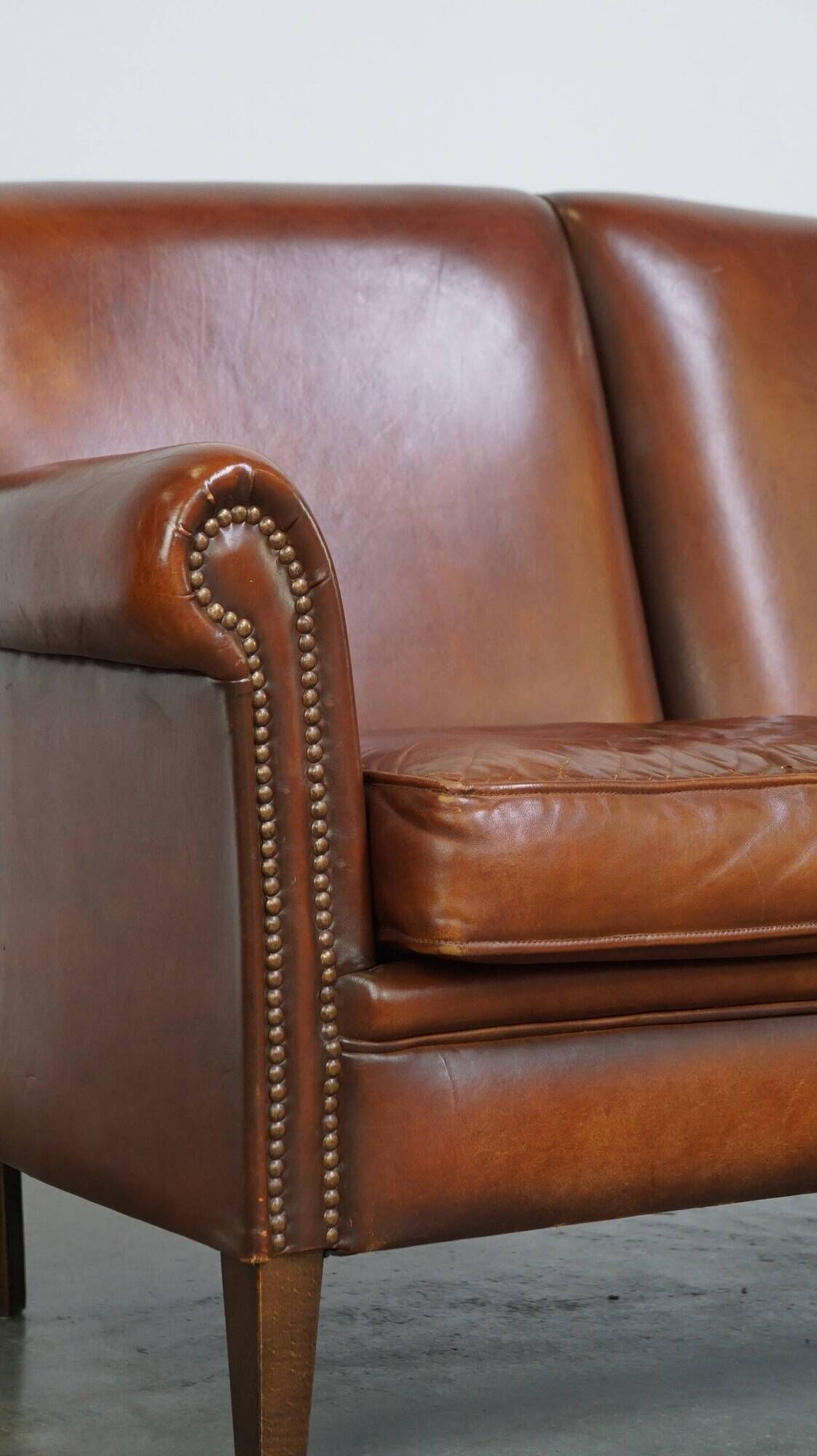 Classic 2 seater sheepskin sofa with beautiful colours and good seating comfort