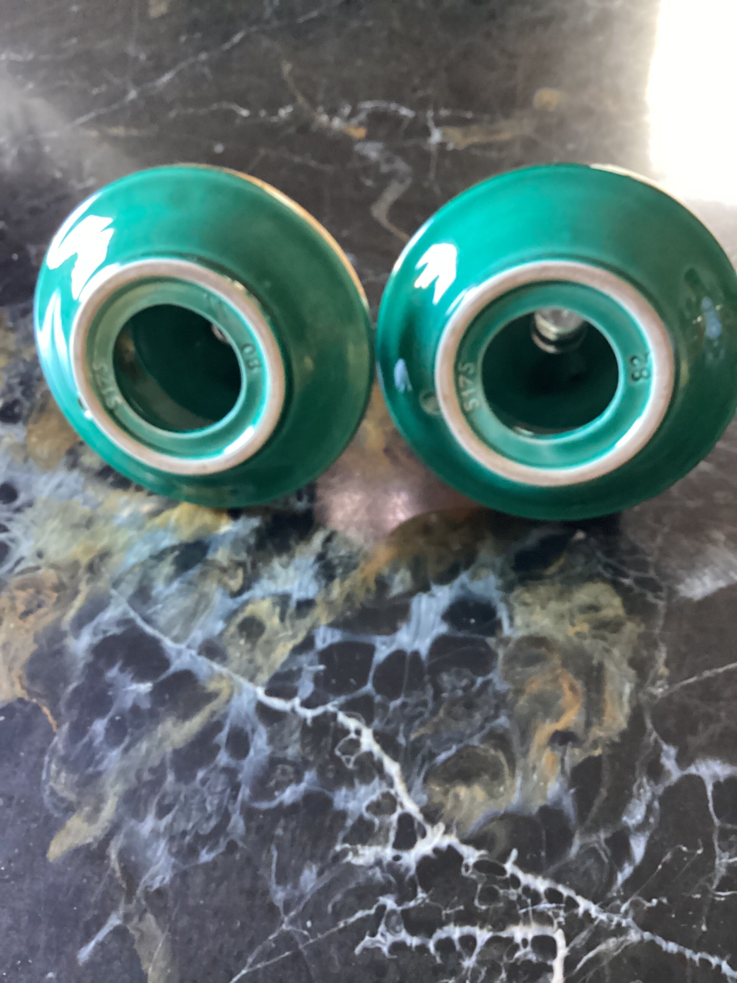 Pair of numbered ceramic candlesticks