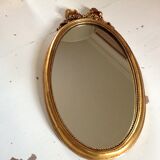 Miroir médaillon en bois doré - 43x24cm