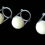 3 designer metal and wood coat hooks