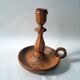 Vintage candlestick holder crafted from turned pine wood Scandinavian-style