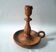 Vintage candlestick holder crafted from turned pine wood Scandinavian-style