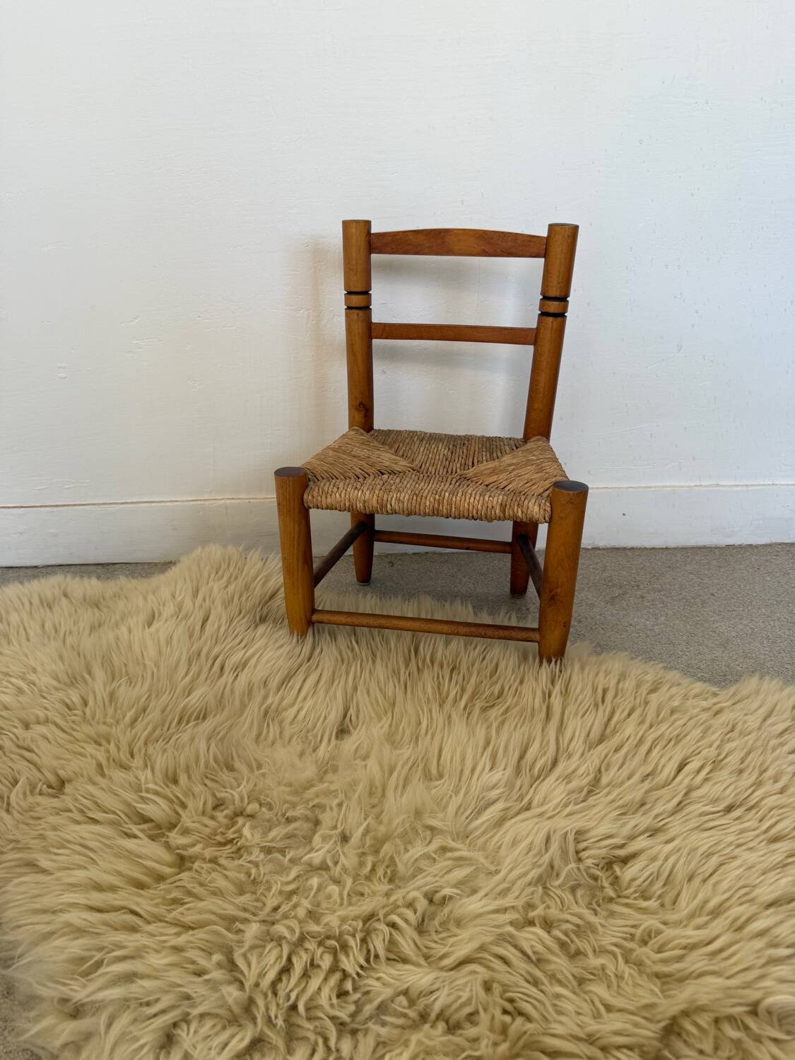 Vintage wooden and straw children's chair