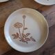 6 plates in light sandstone