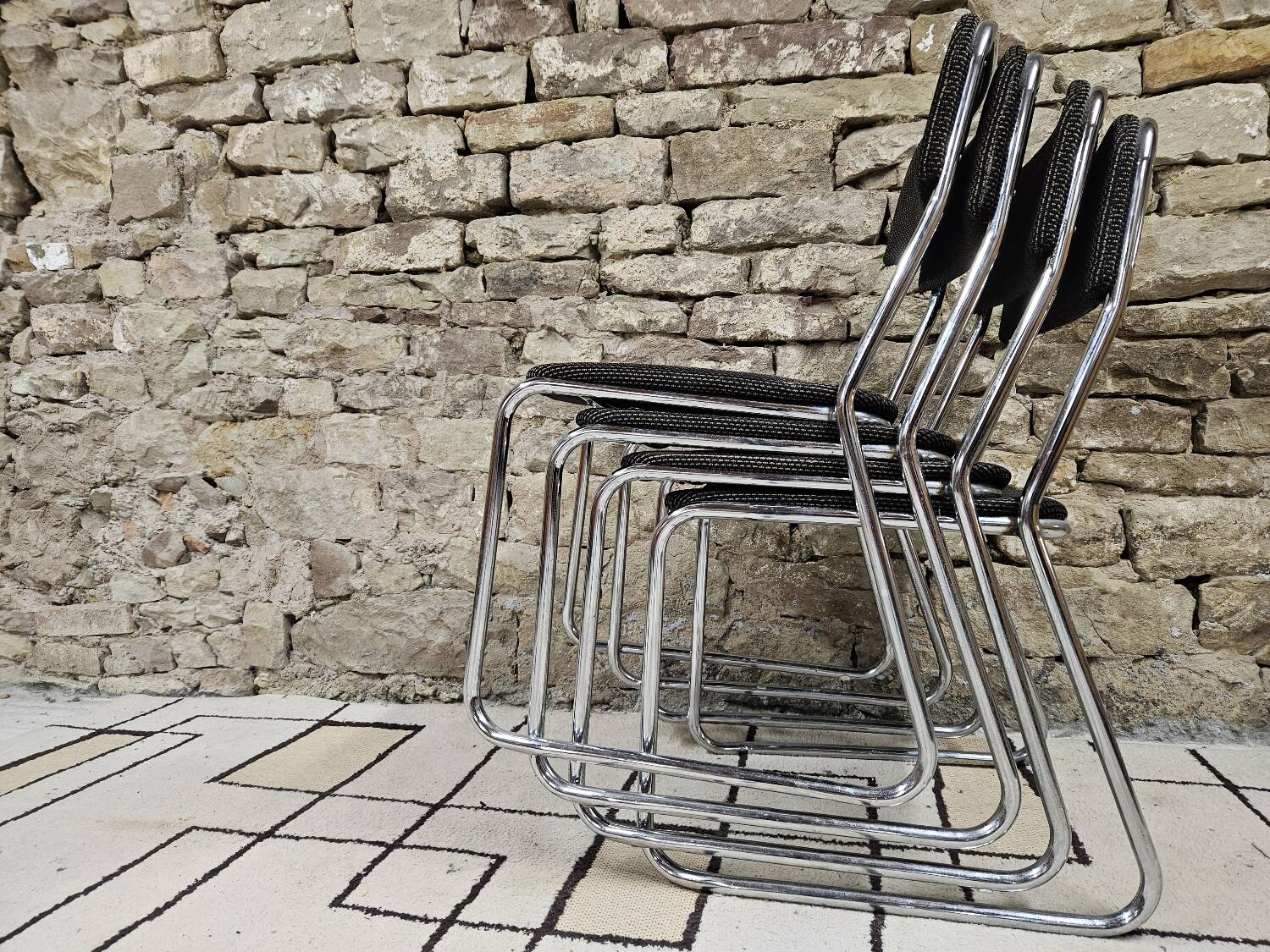 Set of four vintage 1970 sled chairs
