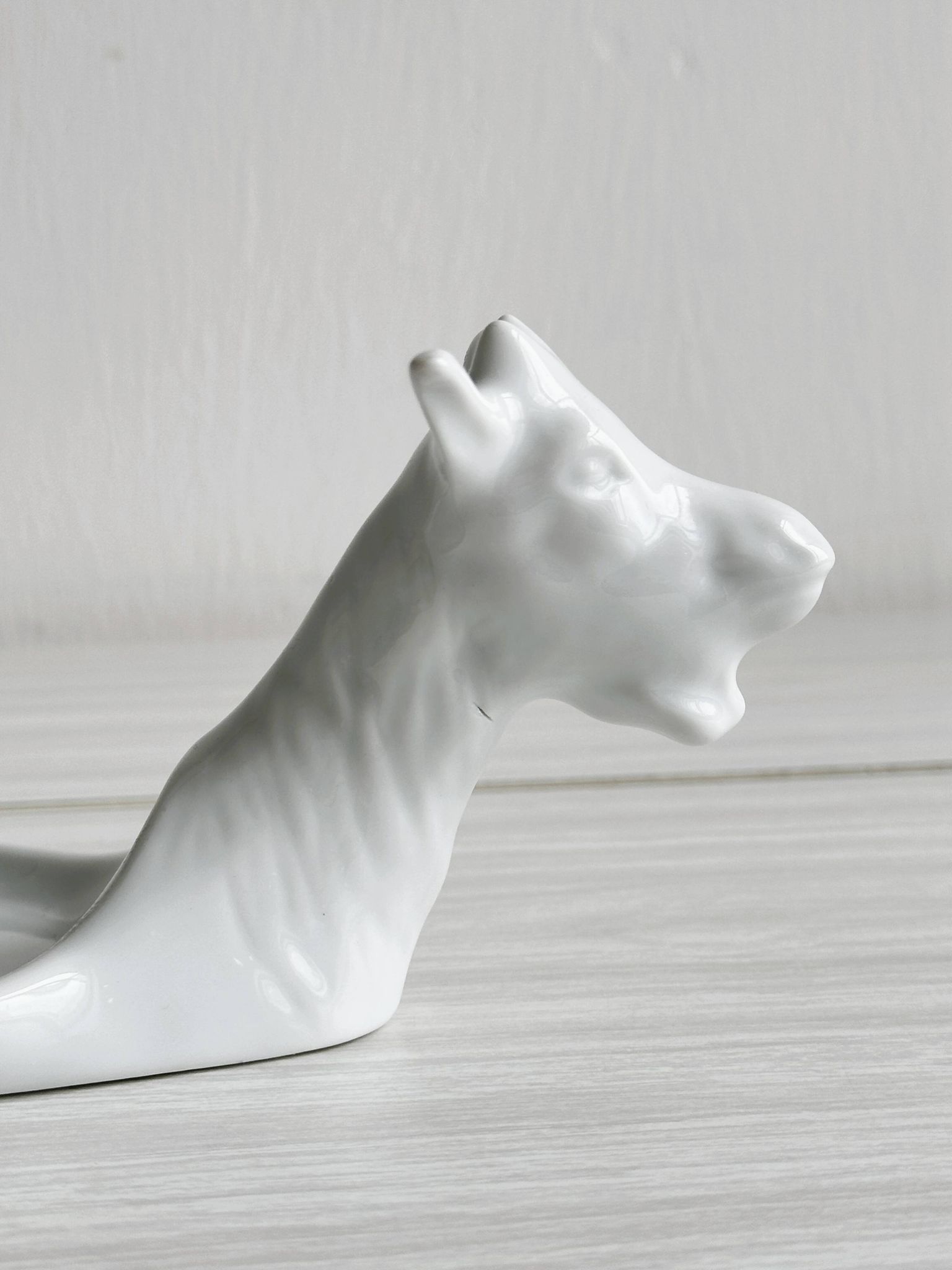 Avignon white porcelain dish in the shape of a goat.
