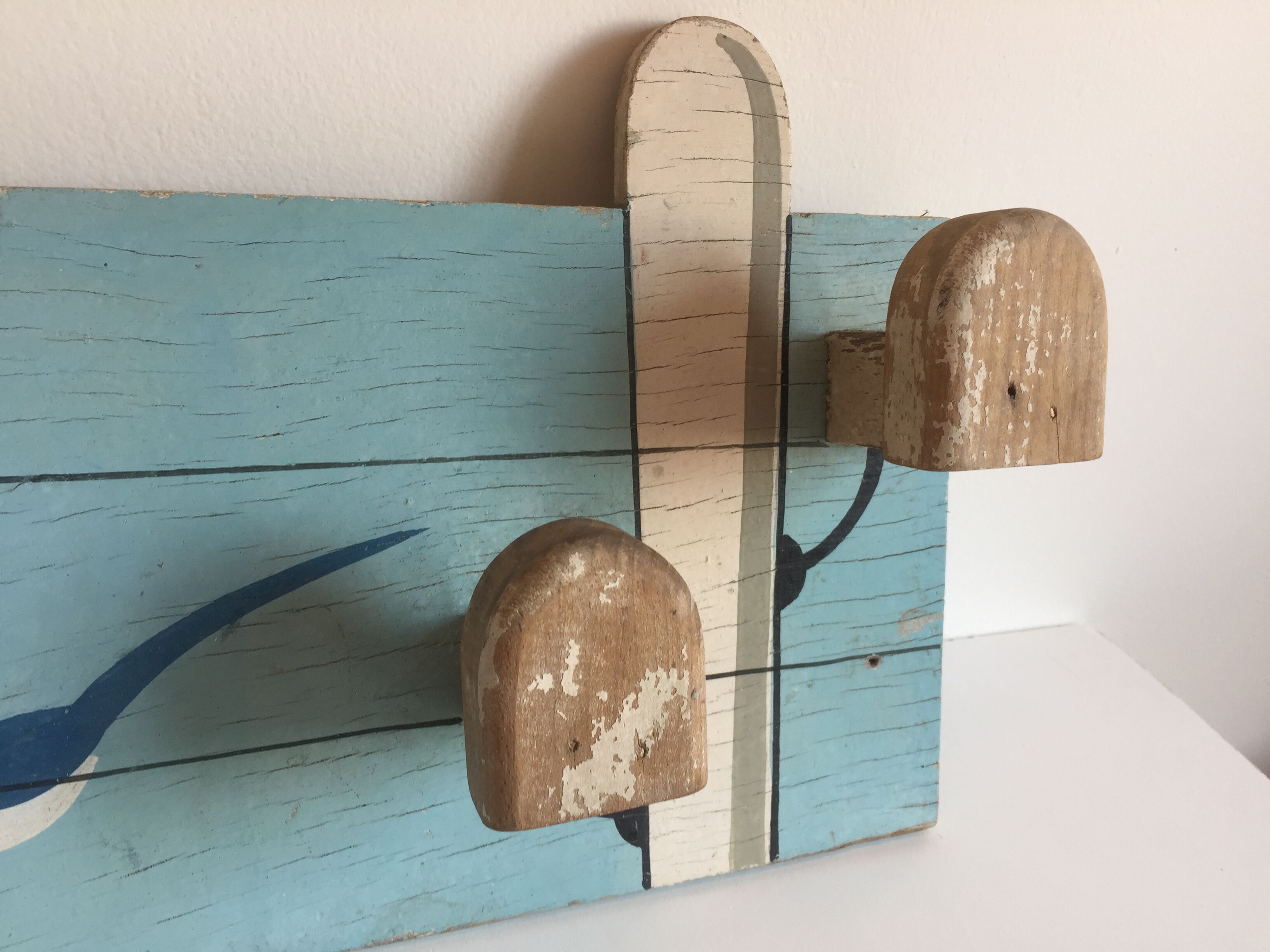 Coat rack with vintage swallows