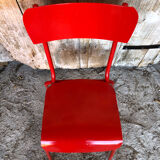 Set of 4 red metal chairs