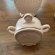 1930s art deco coffee service in pale pink earthenware with shell decoration