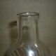 Chiseled glass bottle