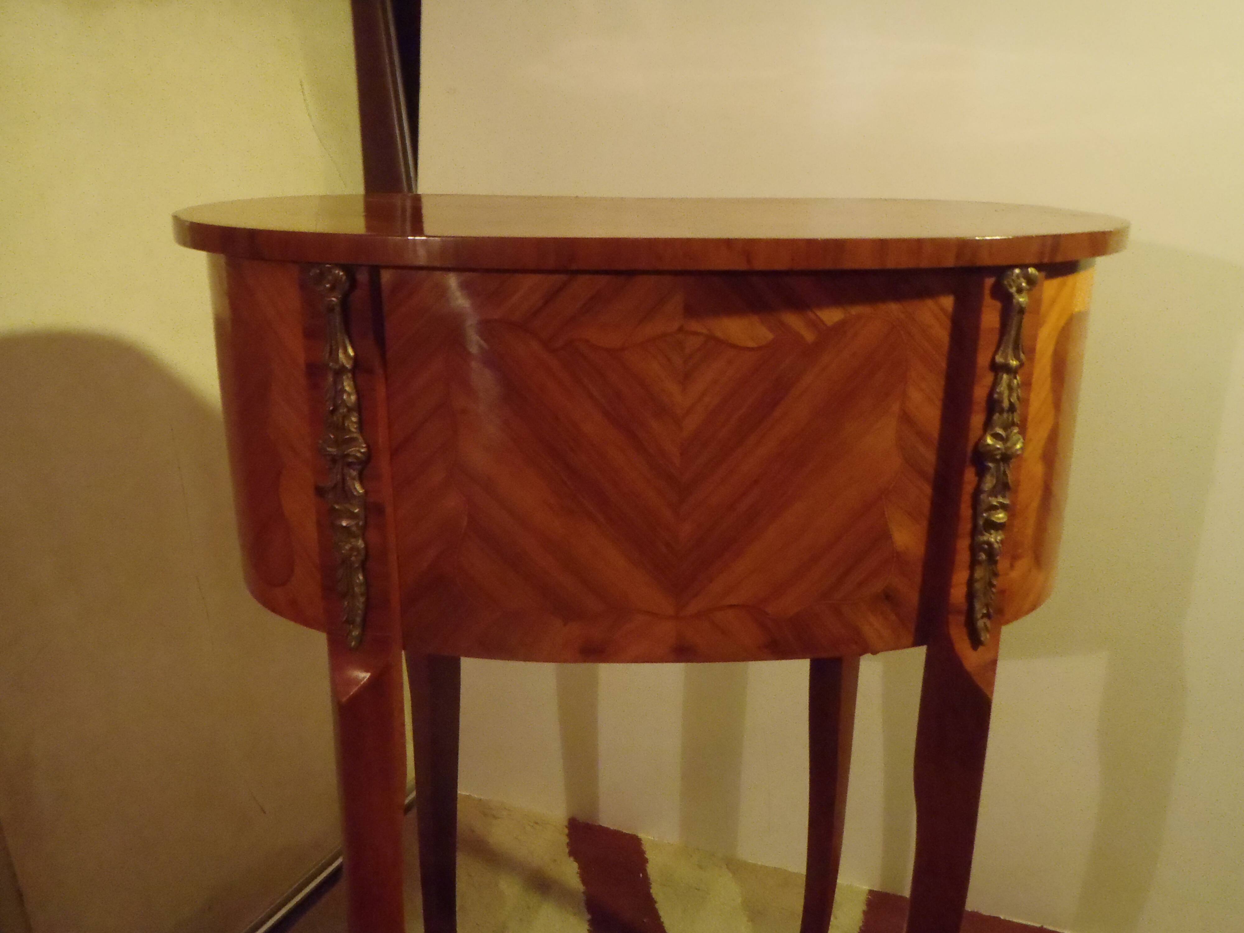 Louis XV style bedside table with varnished marquetry.