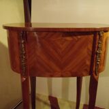 Louis XV style bedside table with varnished marquetry.