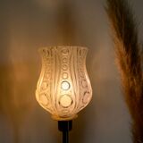 Table lamp with a white tulip lampshade and a gold base