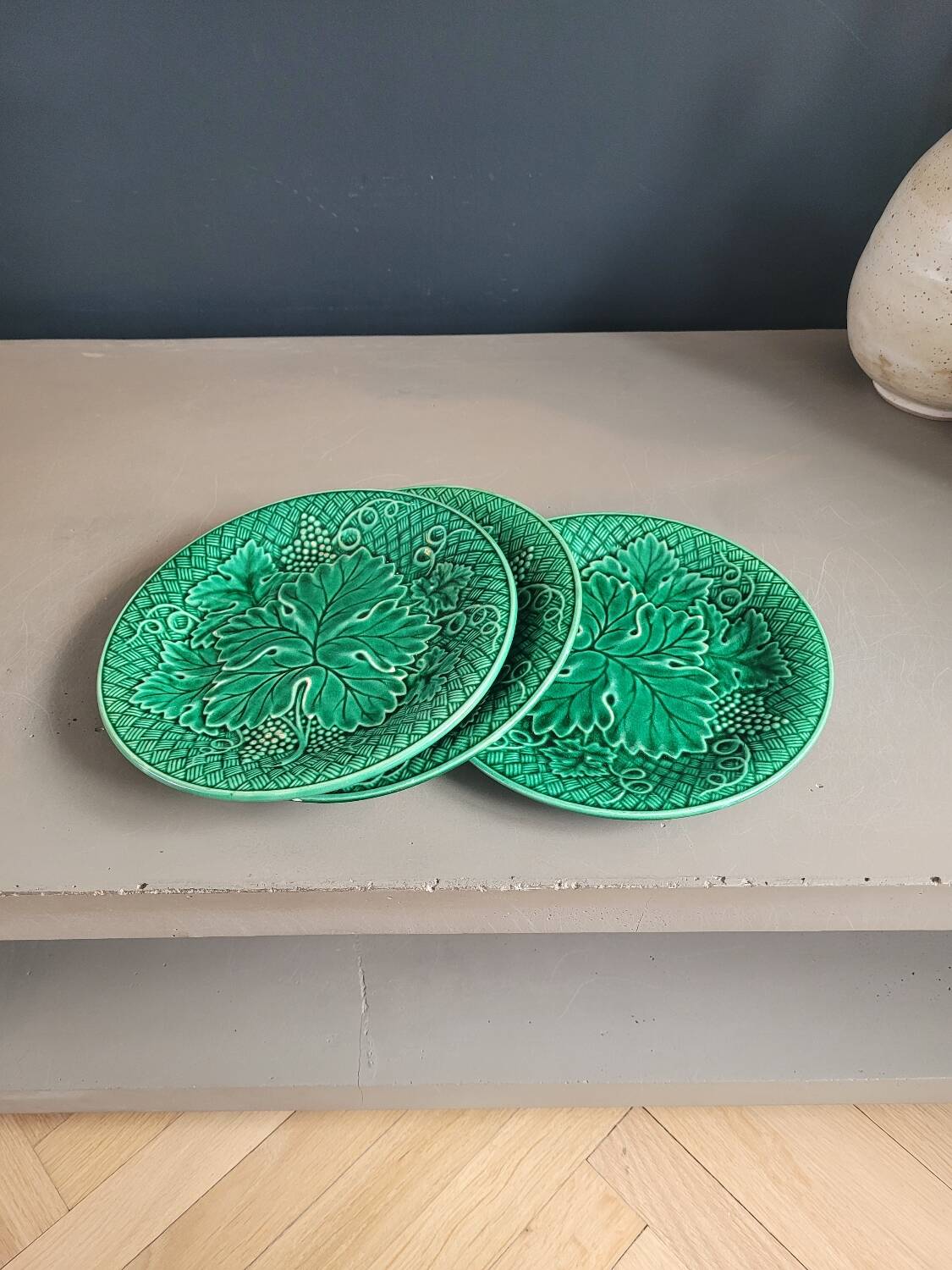 Three green slip plates