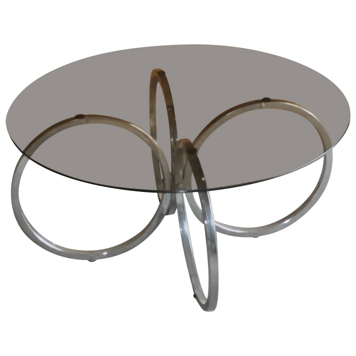 Vintage tubular coffee table in chrome with a transparent glass top, Mid-Century style 1960s.