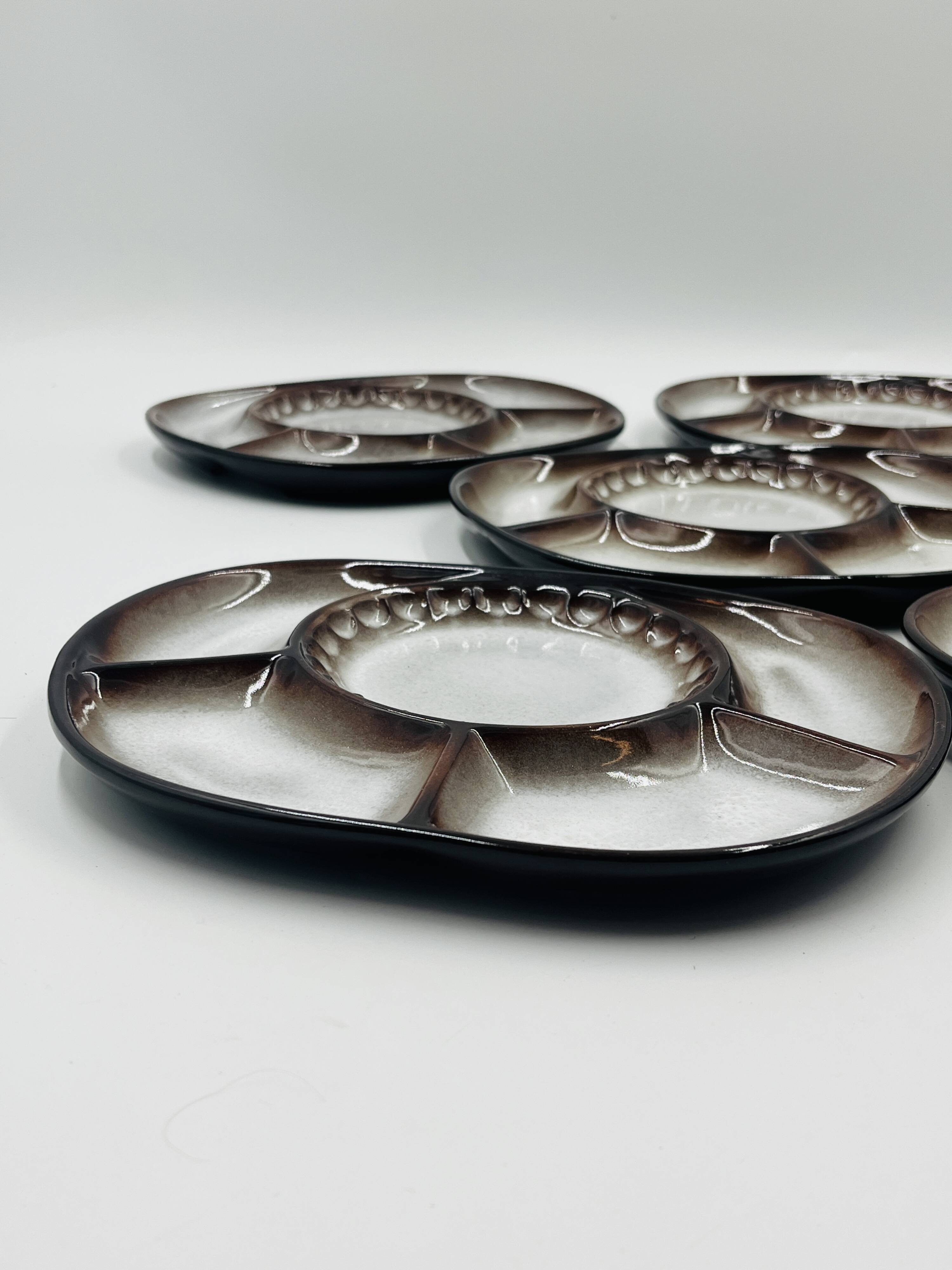 Set of 5 compartmentalised plates by Steuler attributed to Cari Zalloni.