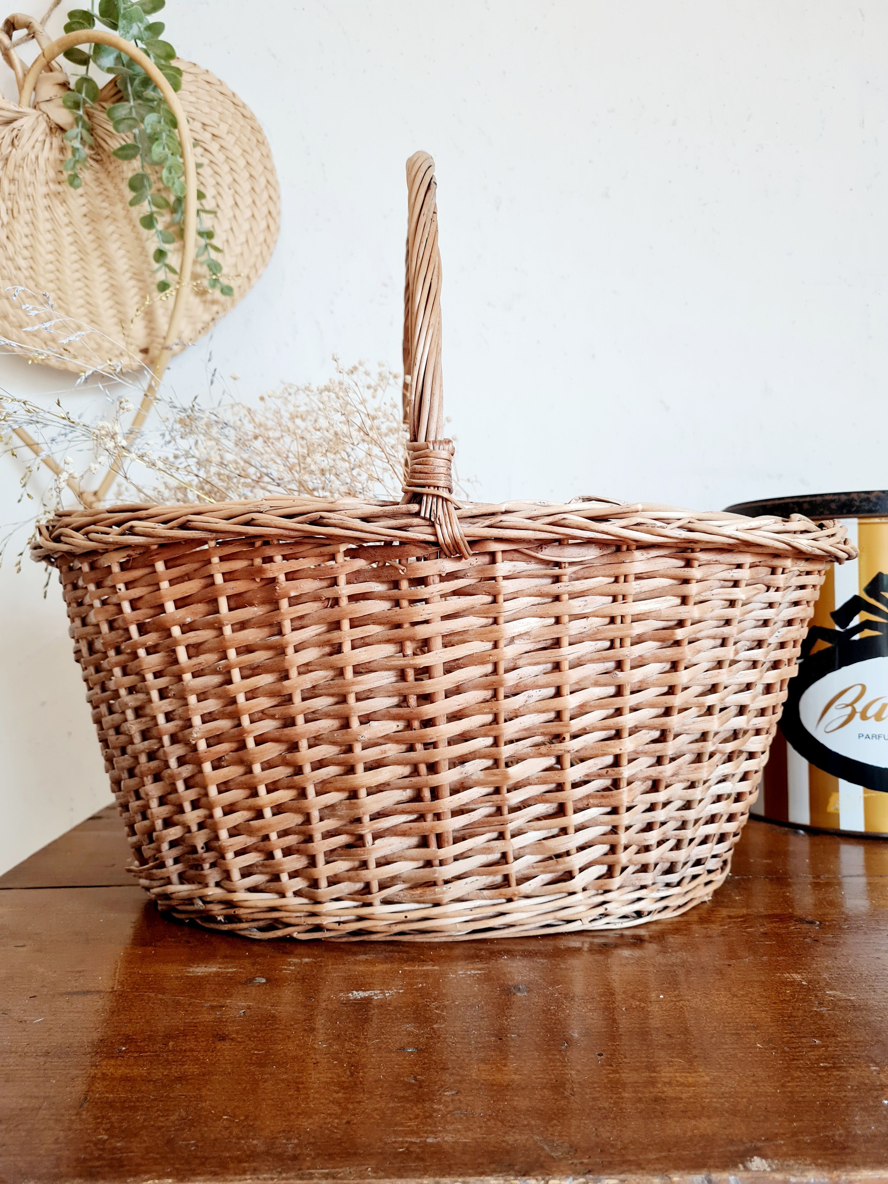 Old basket in woven rattan