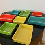 Black metal appetizer set with colorful ceramic ramekins