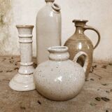 Stoneware decanters and candle holder