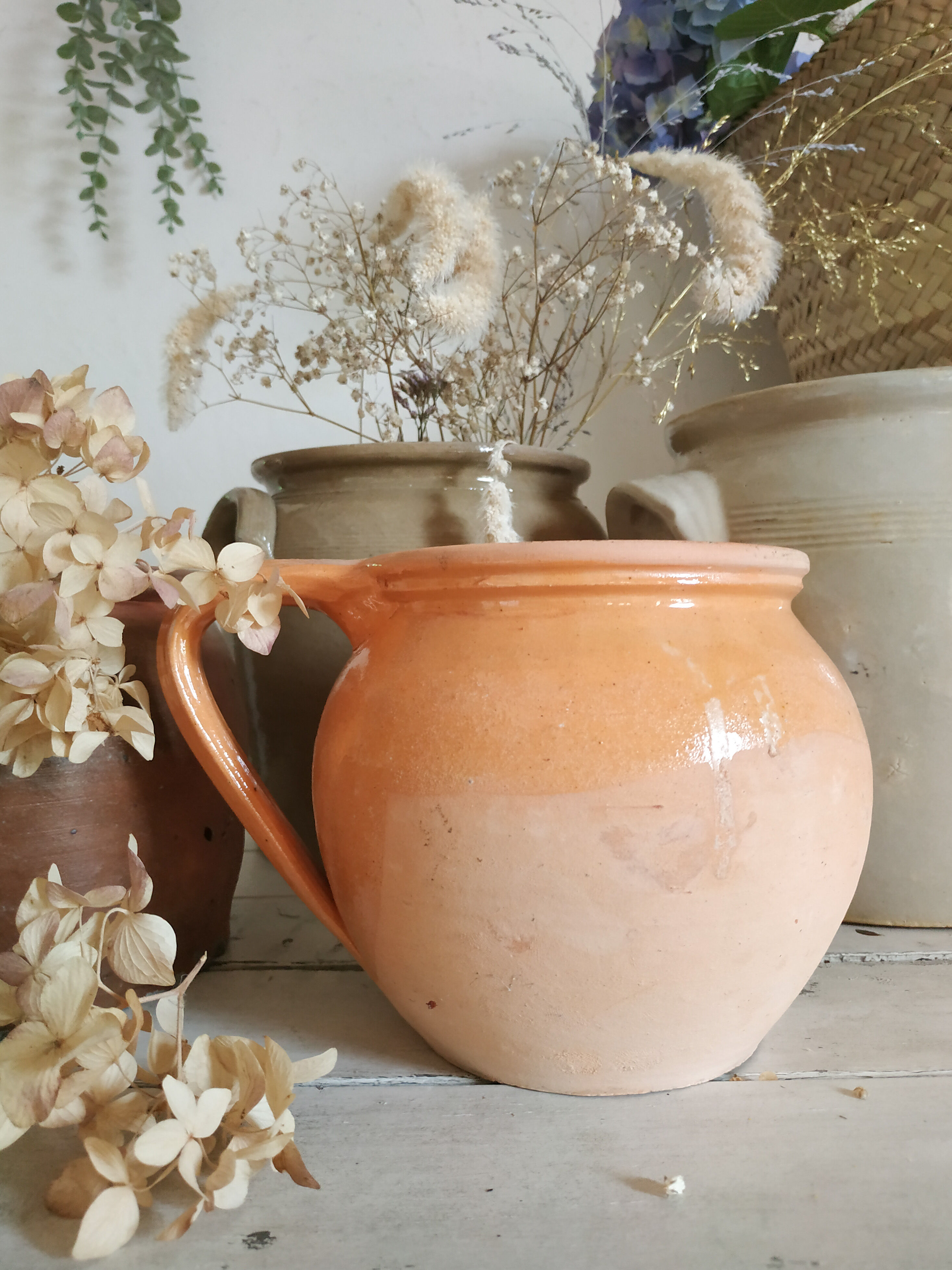 Old terracotta pot glazed ochre color