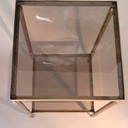 Gilded brass and smoked glass end table, 1960s.