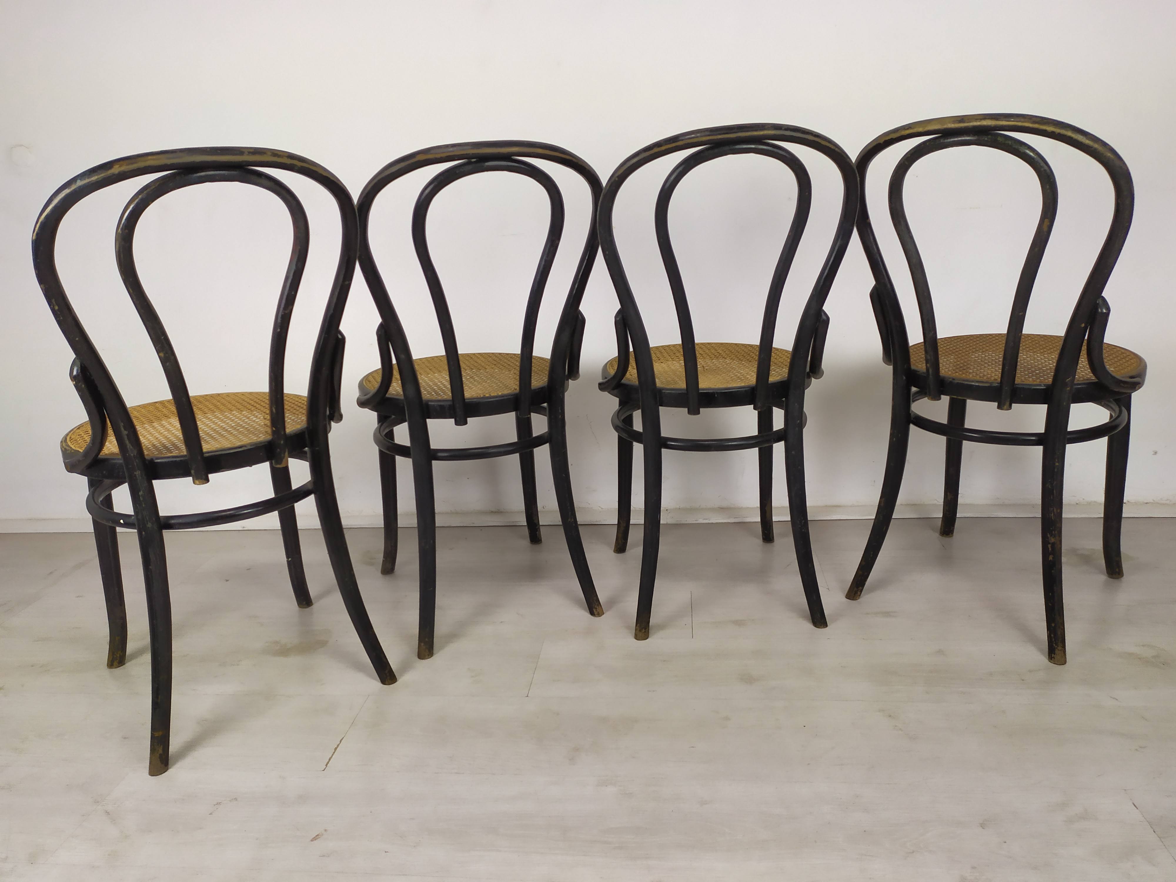 Black canned bistro chairs