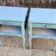 Pair of patinated lagoon blue bedside tables, early 20th century, with curved legs.