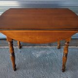 Extendable table with drop-leaf and extensions in solid cherry wood in very good condition