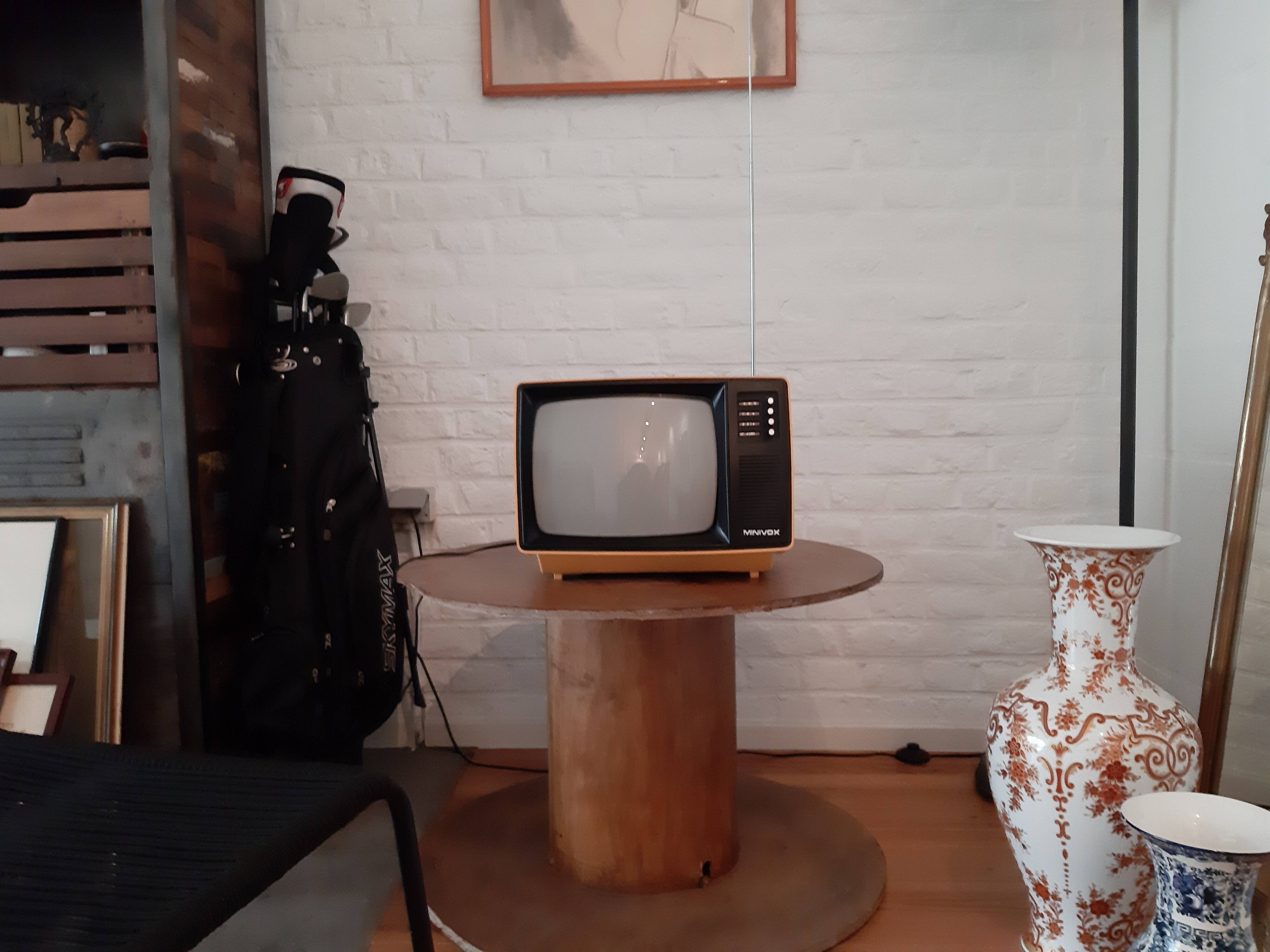 Yellow minivox vintage tv