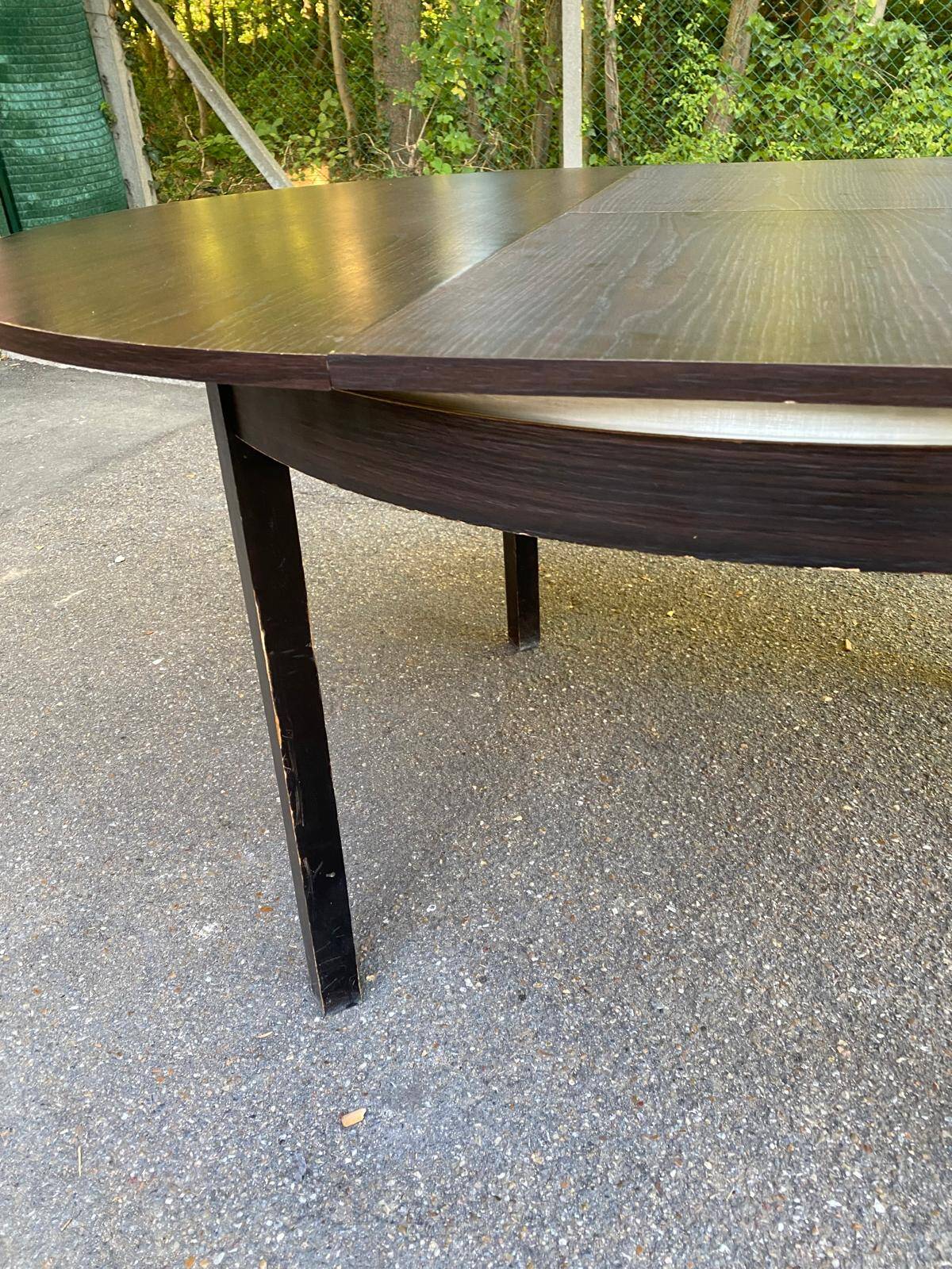 Contemporary round extendable Scandinavian dining table in wenge 1990