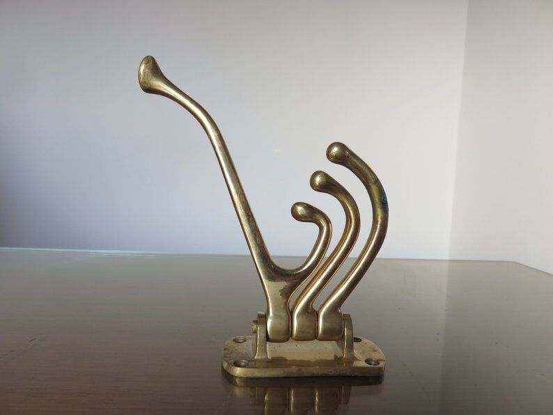 Coatrack swivel brass 70s