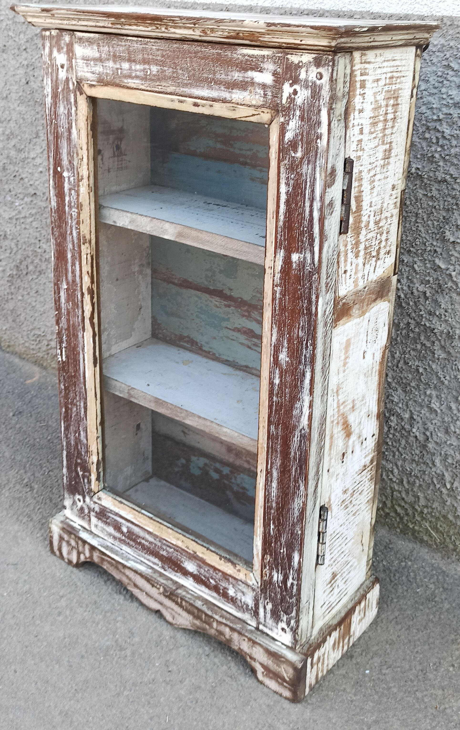 Old small wooden wardrobe with glass door