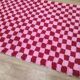 Handmade pure wool rug in traditional pink and red, 150/250 cm.