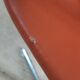 2 orange faux leather swivel chairs