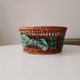 Vintage wicker and rattan basket with tartan fabric.