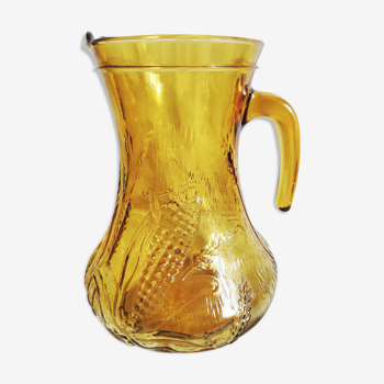 Vintage pitcher in engraved amber yellow glass