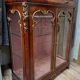 Support display cabinet from the Napoleonic III era in mahogany, gilded bronze, and white marble.